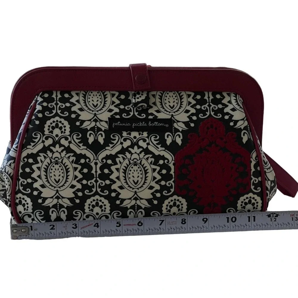 PETUNIA PICKLE BOTTOM red and black diaper changing clutch bag